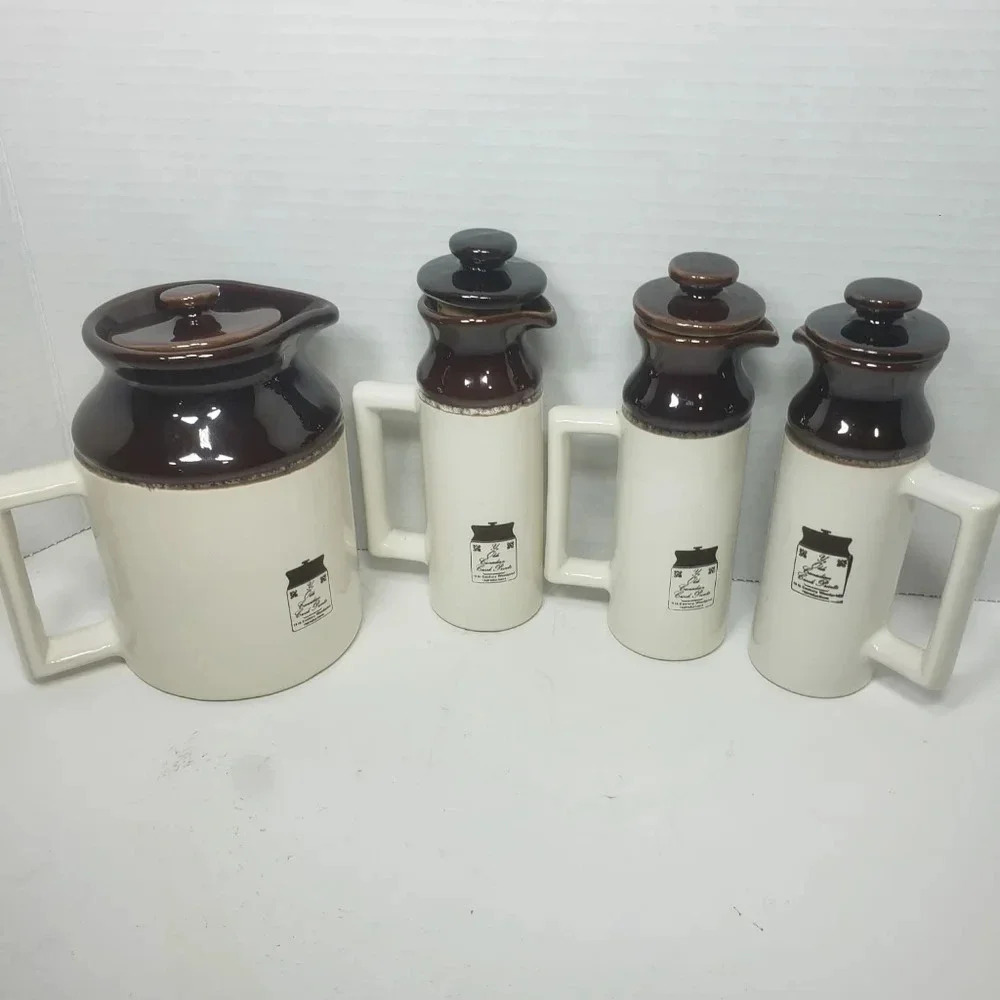 Vintage Abenakis Set  of 4 Hand crafted Crock Mini Pitchers with Lids.
